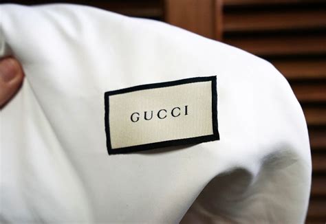 what does a real gucci tag look like|authentic gucci clothing tags.